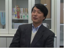 対談中の左巻先生